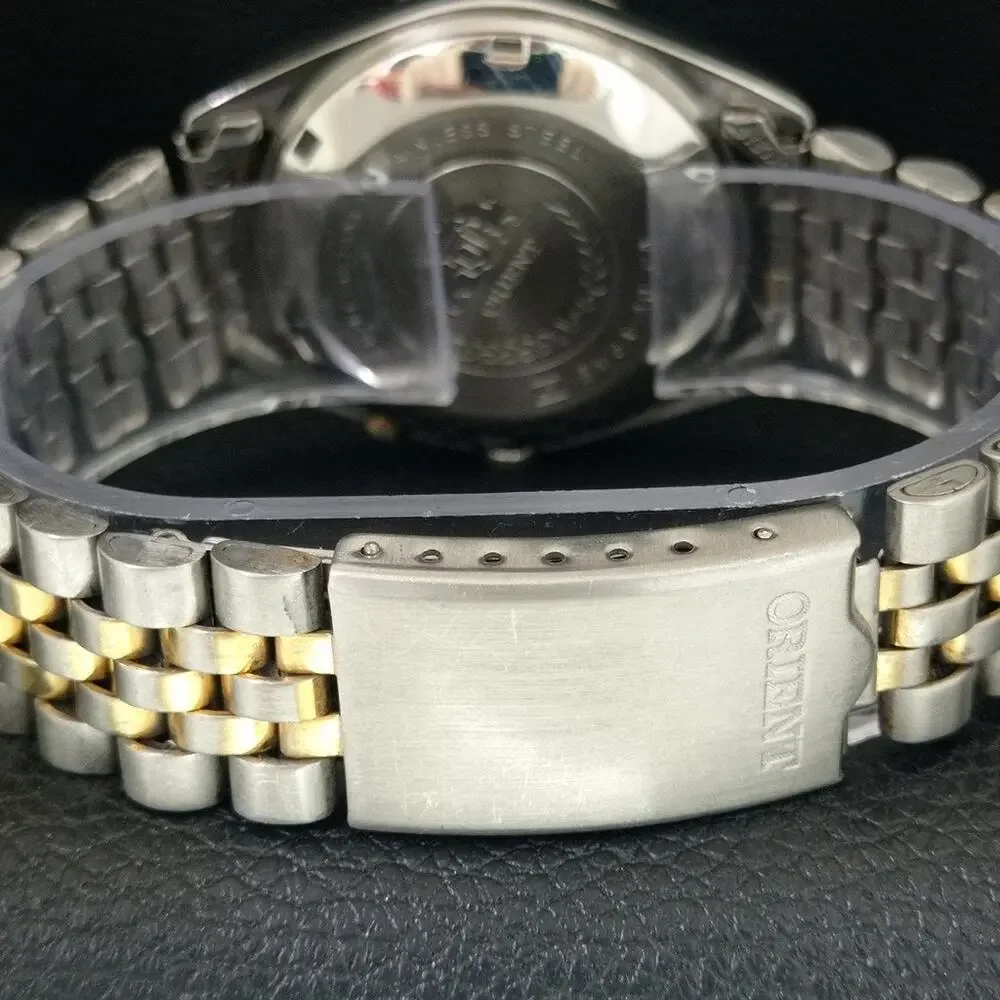 Vintage 1976 Orient Automatic Mens Silver Watch W/daydate & Silver accents
